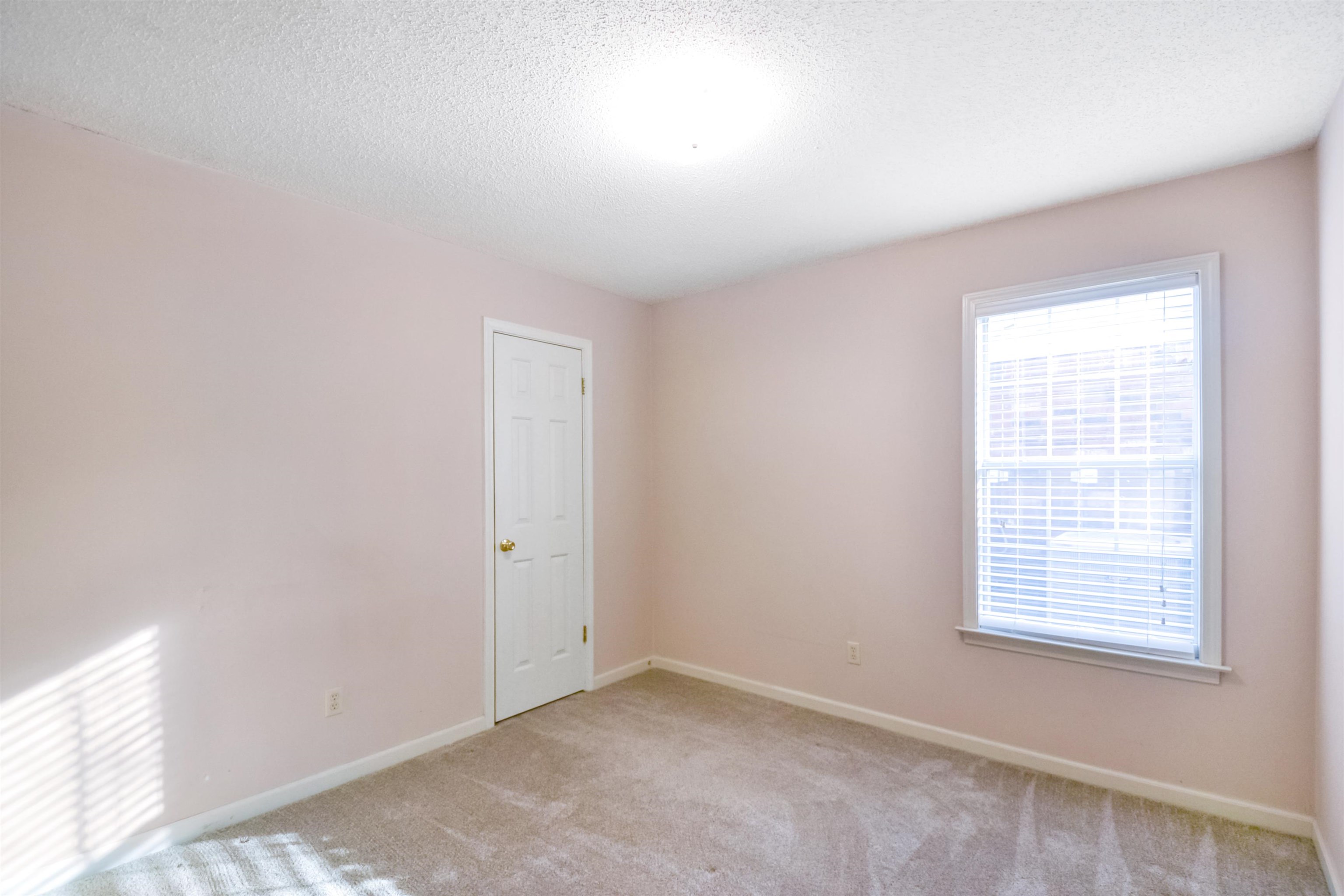 1441 Milestone Circle Collierville, TN 38017 - Photo 21 of 27 an empty room with windows