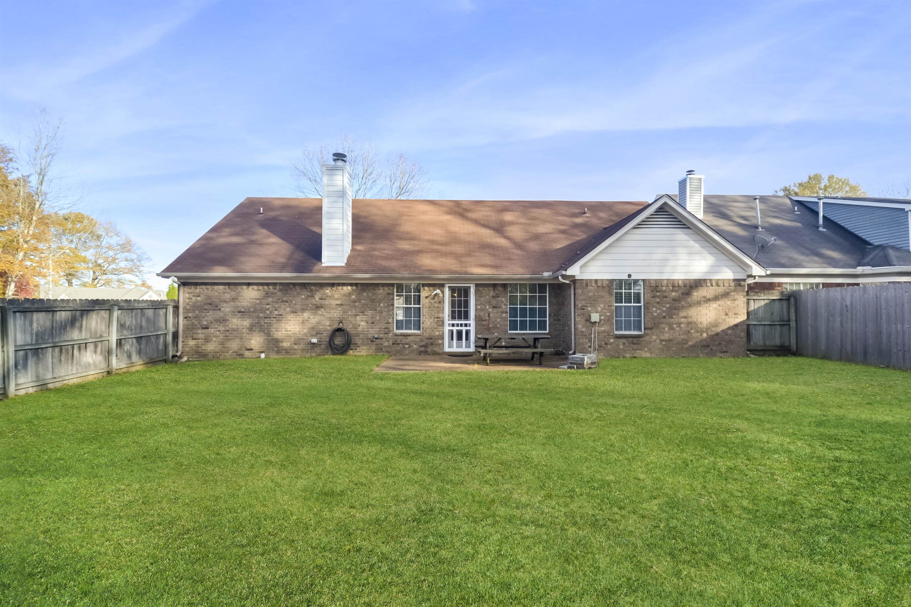 1441 Milestone Circle Collierville, TN 38017 - Photo 25 of 27 a front view of a house with a garden