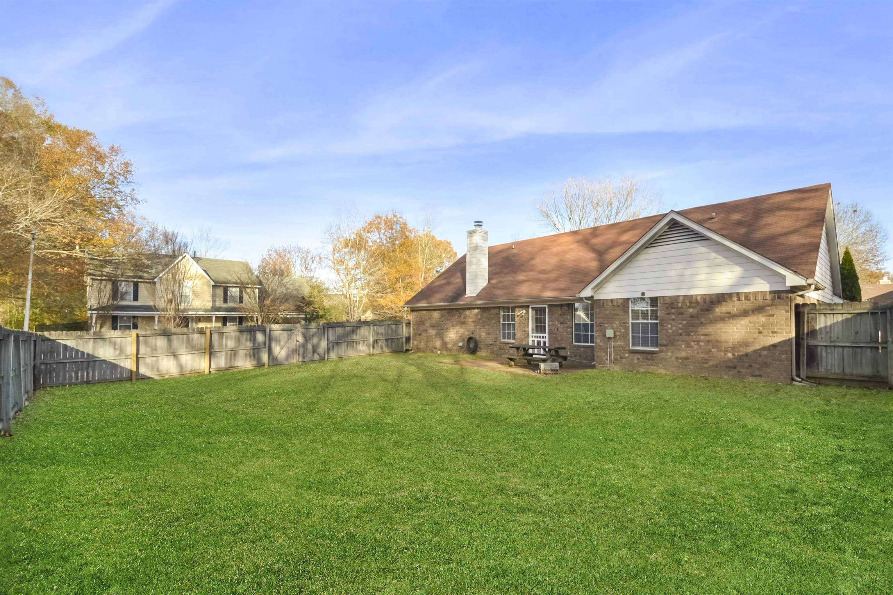 1441 Milestone Circle Collierville, TN 38017 - Photo 26 of 27 a view of a house with a yard and sitting area
