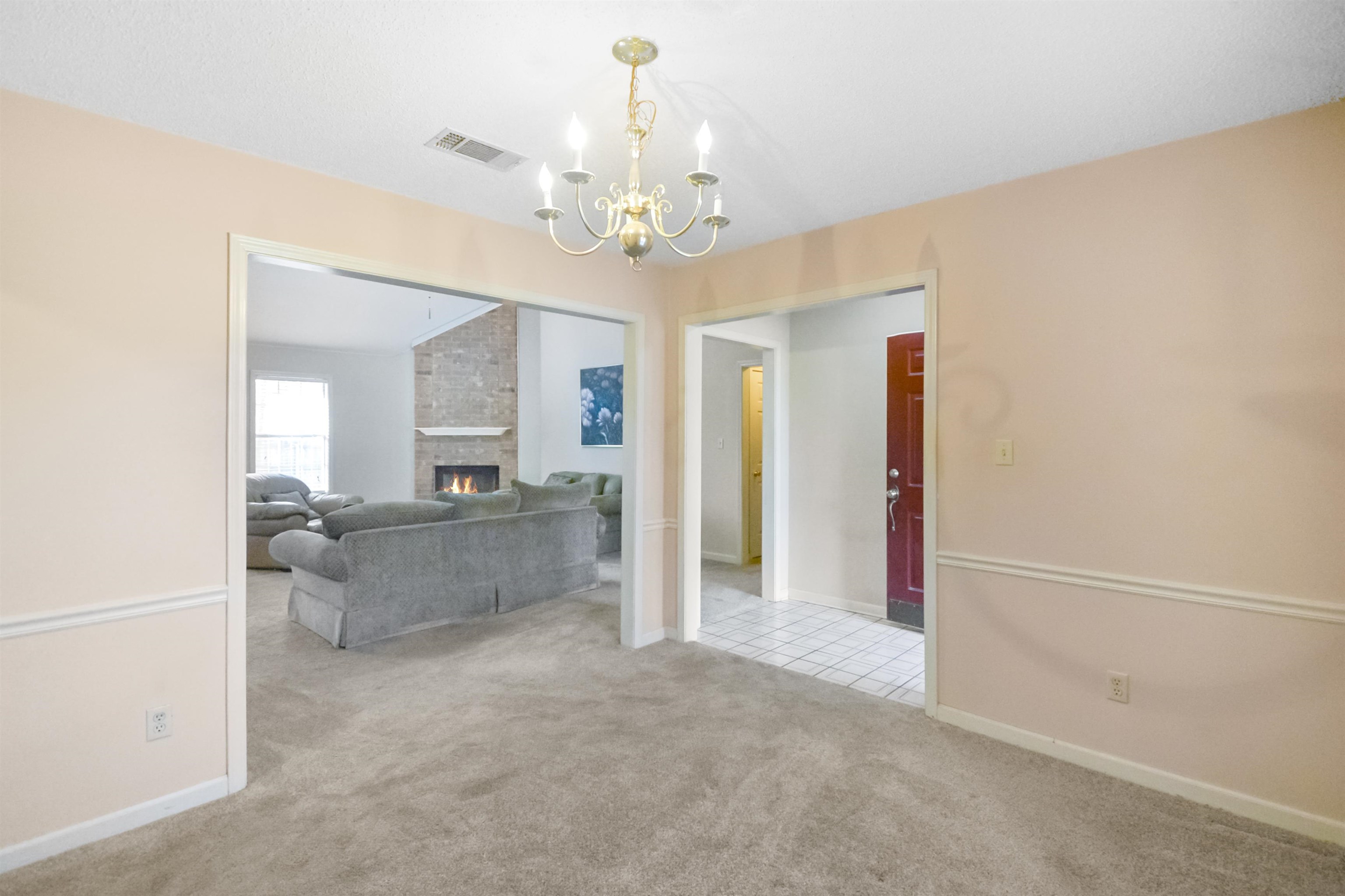 1441 Milestone Circle Collierville, TN 38017 - Photo 4 of 27 a view of a hallway with chandelier