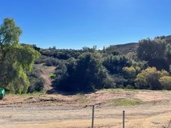a view of a yard with mountain