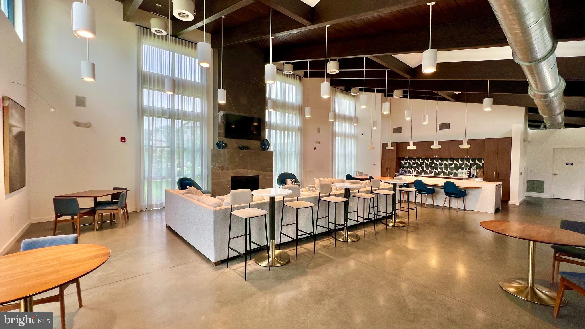 824 Teacher MItchell Road Glen Burnie, MD 21060 - Photo 42 of 46 Clubroom with Fireplace and Lounge Area