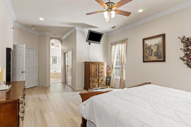 a view of a patio with a table chairs and a backyard