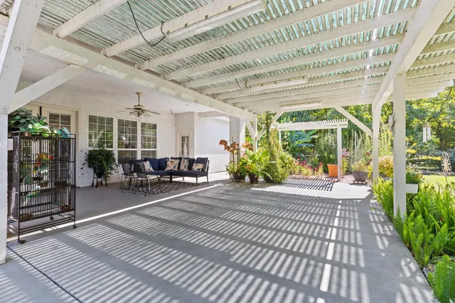 a view of a house with a big yard