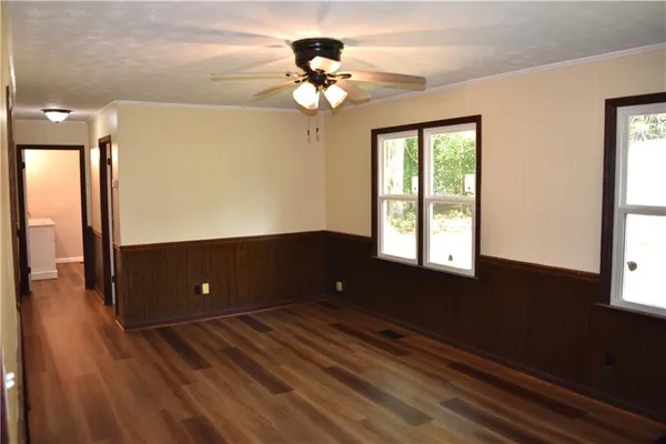 a view of outdoor space with wooden floor