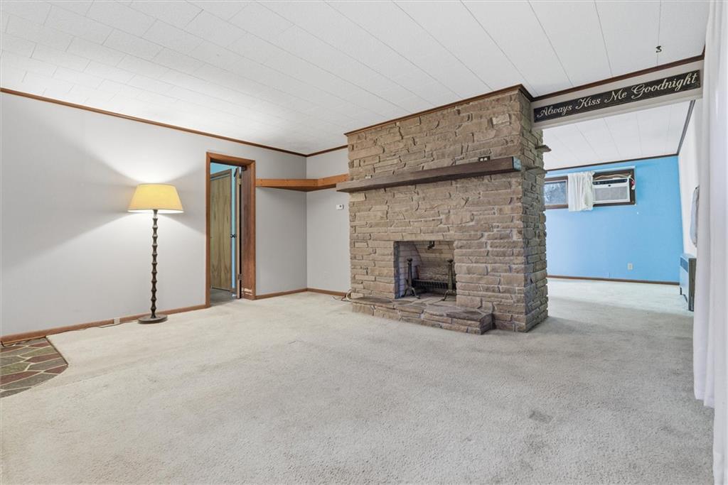 312 Flatwoods Road Vanderbilt, PA 15486 - Photo 22 of 48 a view of an empty room with a fireplace