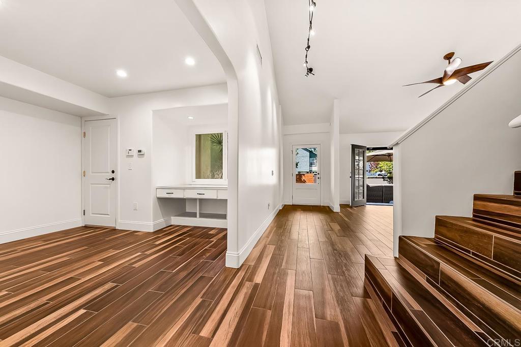 1641 Tucker Lane Encinitas, CA 92024 - Photo 13 of 58 a view of a room with wooden floor