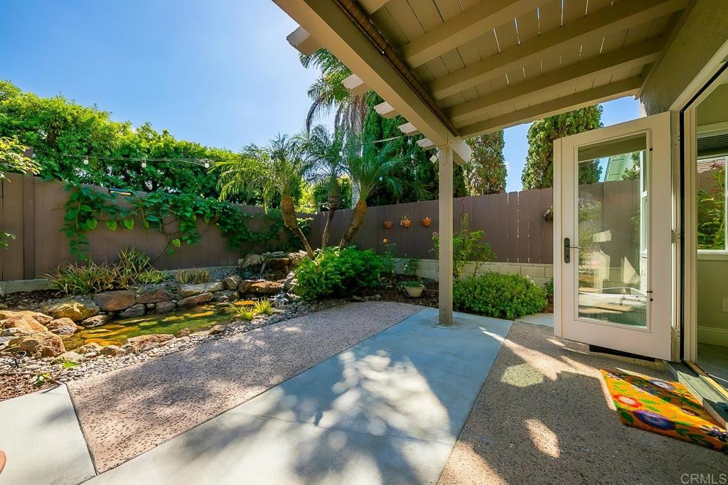 1641 Tucker Lane Encinitas, CA 92024 - Photo 30 of 58 a view of backyard with swimming pool and seating space