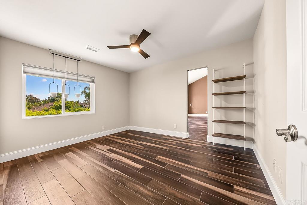 1641 Tucker Lane Encinitas, CA 92024 - Photo 46 of 58 a view of an empty room with a window