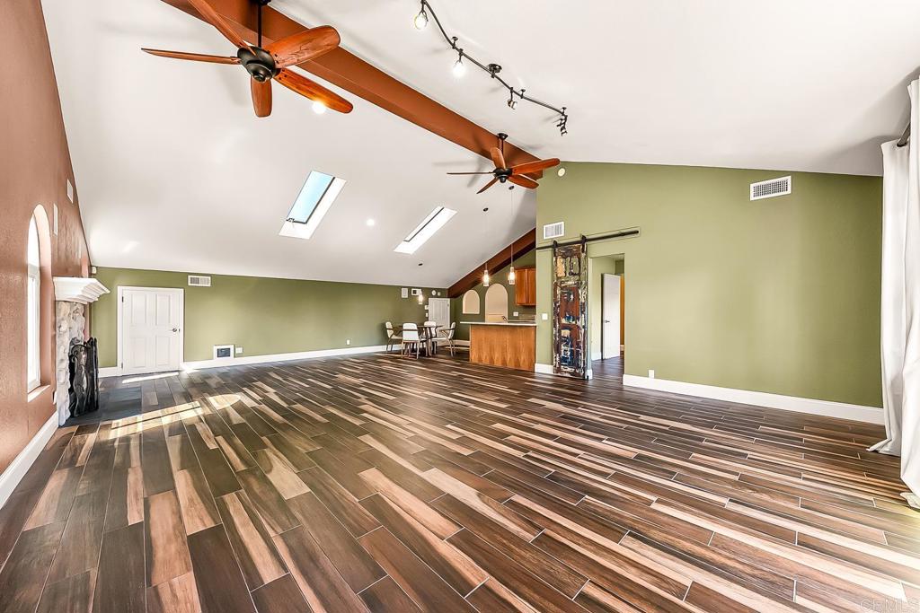 1641 Tucker Lane Encinitas, CA 92024 - Photo 53 of 58 a view of a room with wooden floor