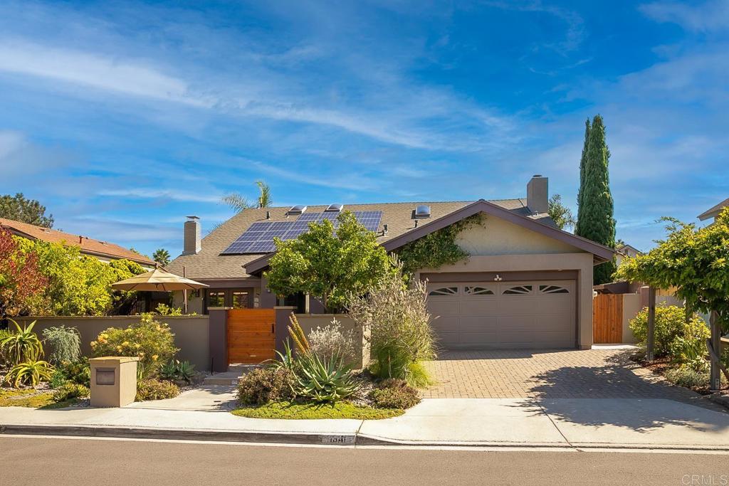 1641 Tucker Lane Encinitas, CA 92024 - Photo 58 of 58 a front view of a house with a yard garage and outdoor seating