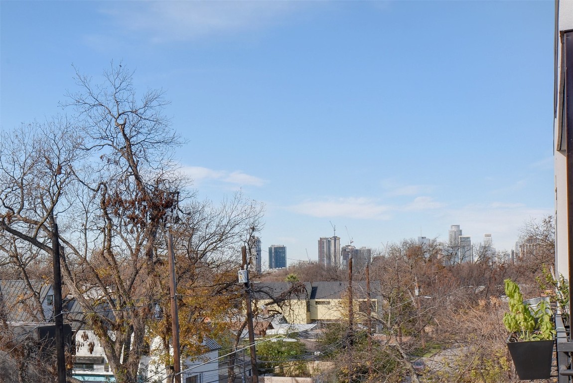 2709 East 5th Street, Unit 2303 Austin, TX 78702 - Photo 16 of 18 a view of a city with tall trees