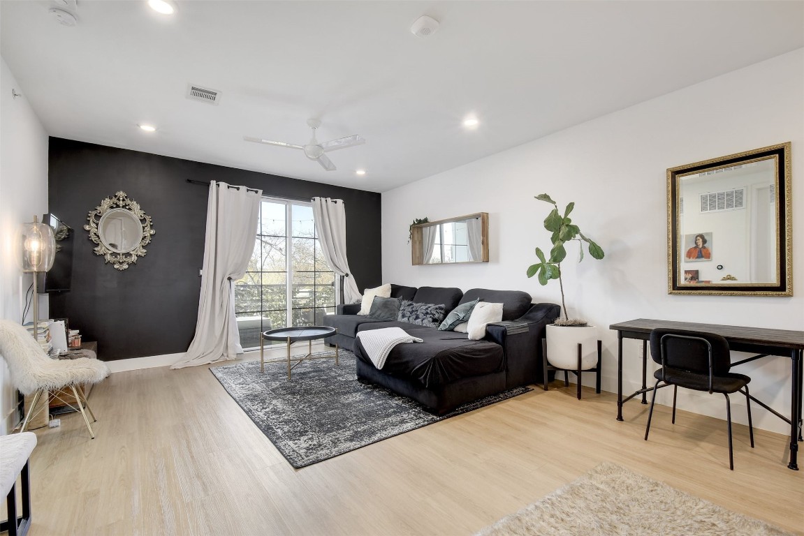 2709 East 5th Street, Unit 2303 Austin, TX 78702 - Photo 2 of 18 a living room with furniture and a large window