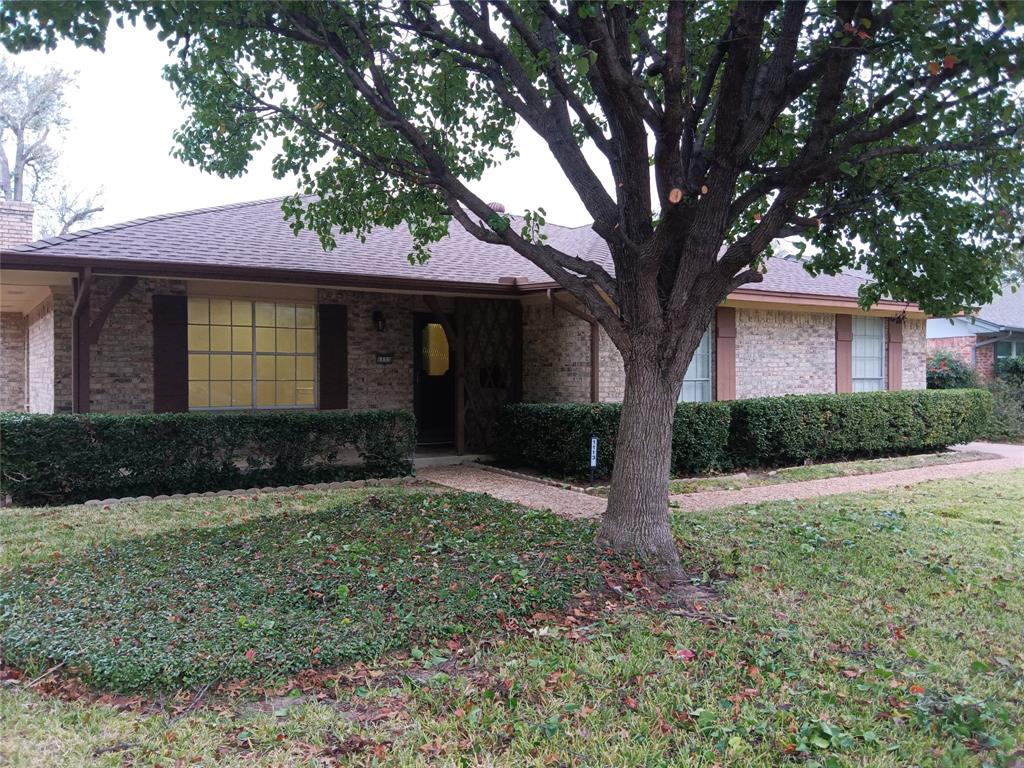 1113 Janell Drive Irving, TX 75062 - Photo 2 of 25 a front view of a house with garden