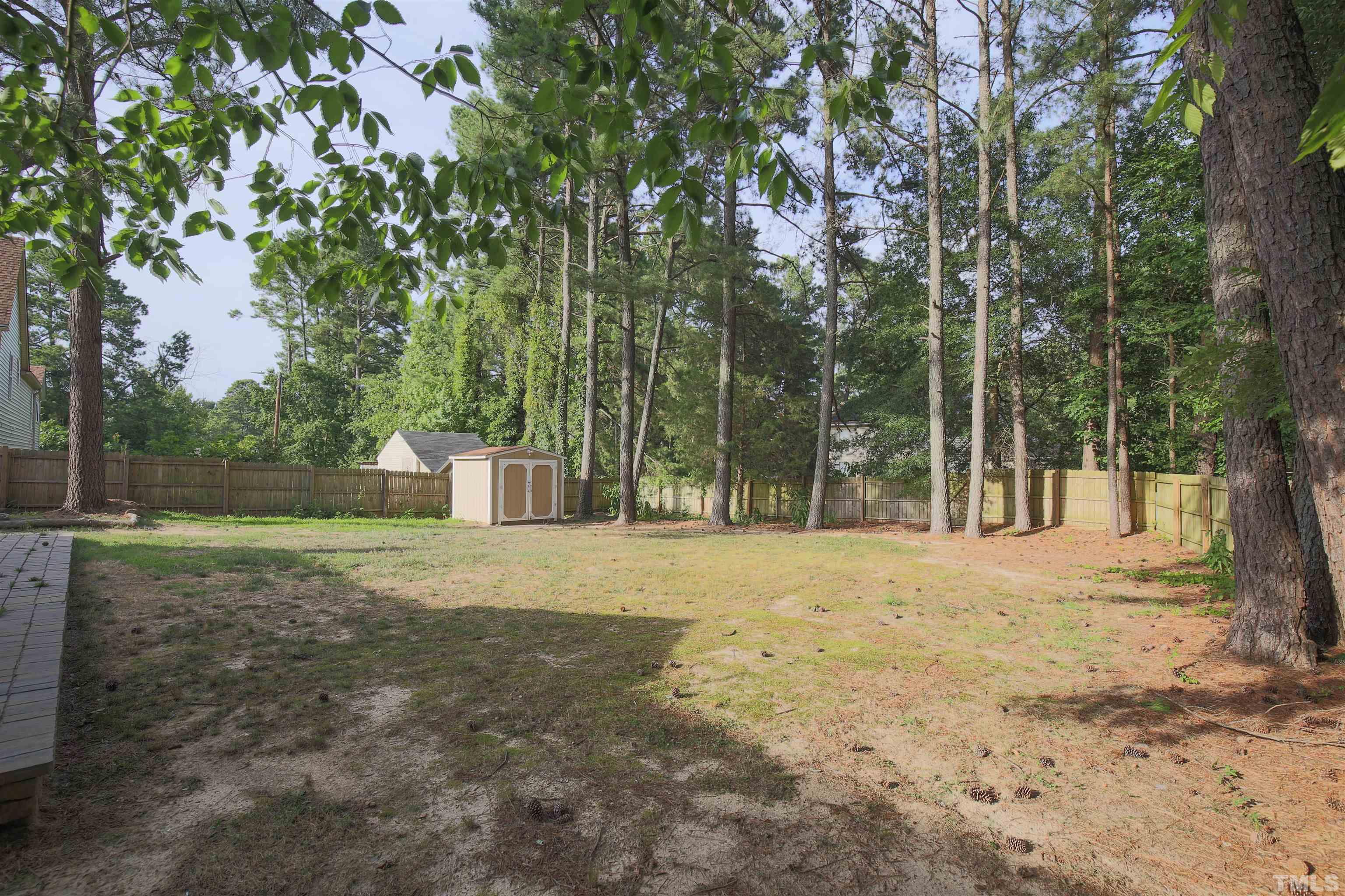 5405 Barbee Road Durham, NC 27713 - Photo 17 of 17 a view of a yard with a tree