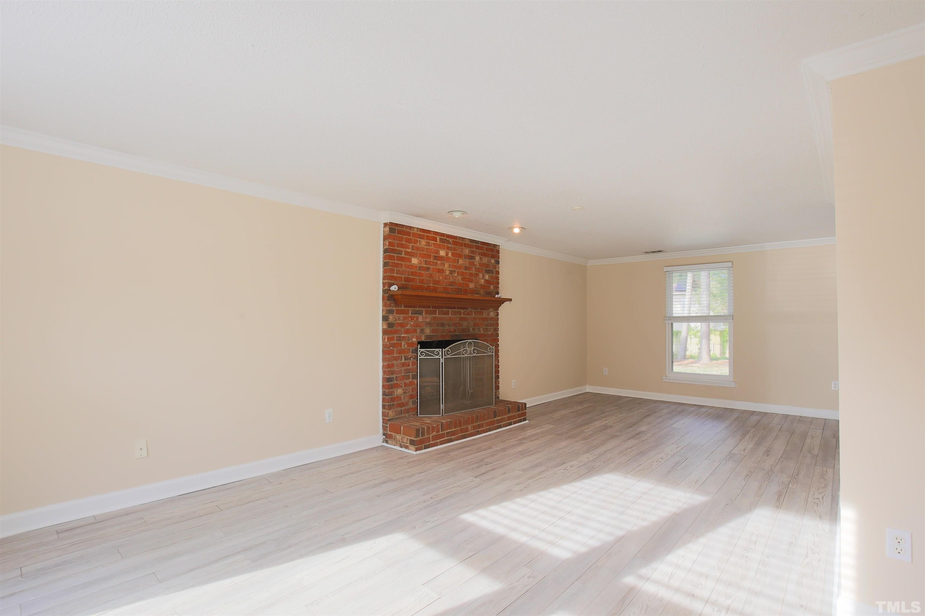 5405 Barbee Road Durham, NC 27713 - Photo 3 of 17 an empty room with windows
