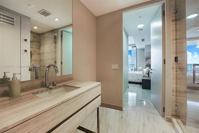 a view of swimming pool with a patio