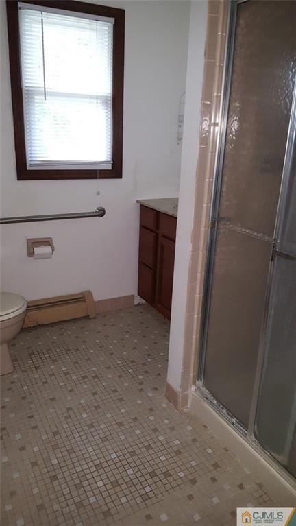 131 South Cliff Road Colonia, NJ 07067 - Photo 11 of 20 a view of a bathroom with a window