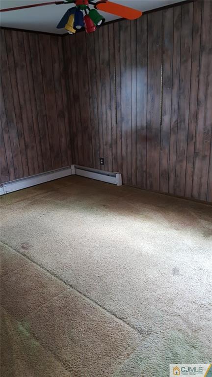 131 South Cliff Road Colonia, NJ 07067 - Photo 9 of 20 a view of wooden floor and fence