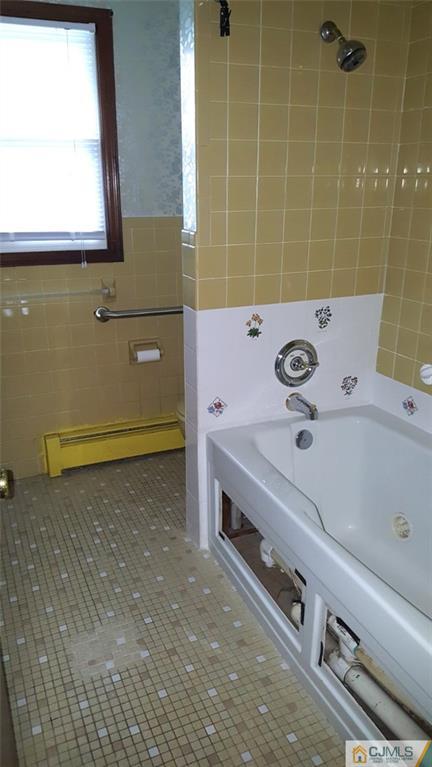 131 South Cliff Road Colonia, NJ 07067 - Photo 10 of 20 a bathroom with a sink and a window