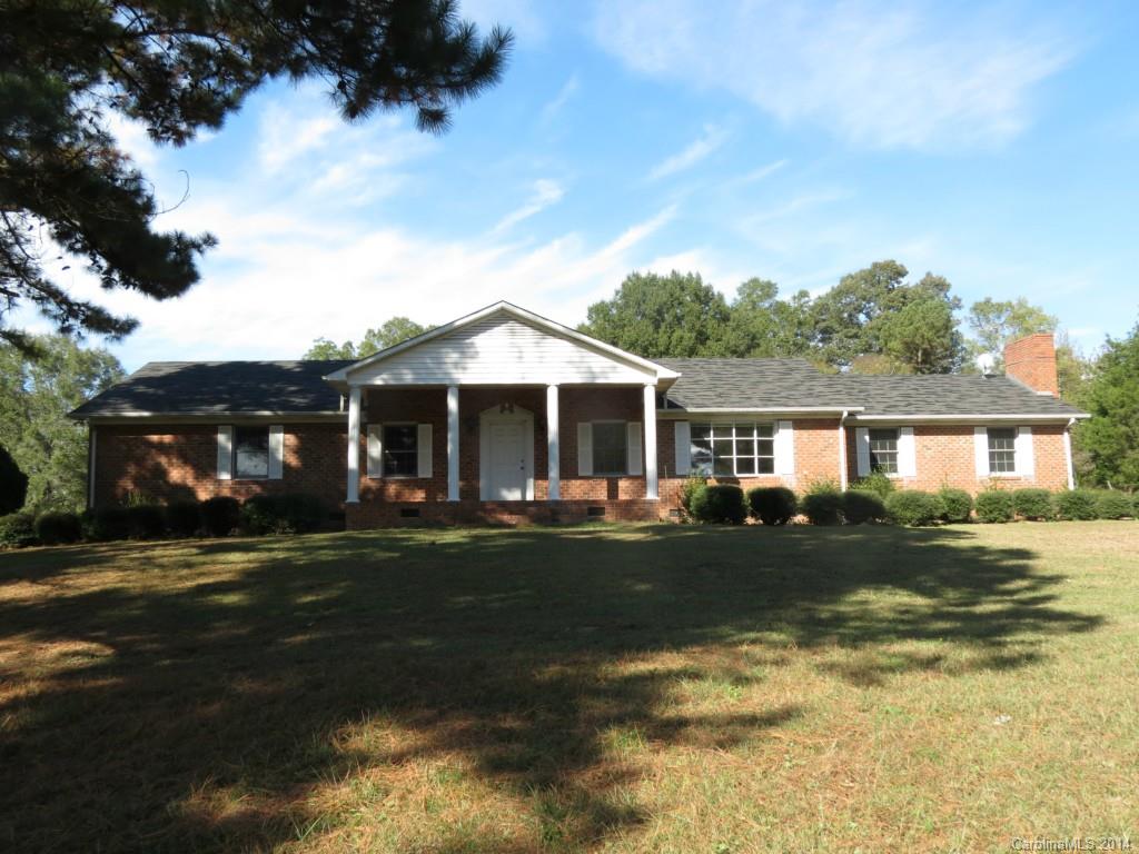 4655 Percival Road Rock Hill, SC 29730 - Photo 1 of 14 a front view of a house with a garden