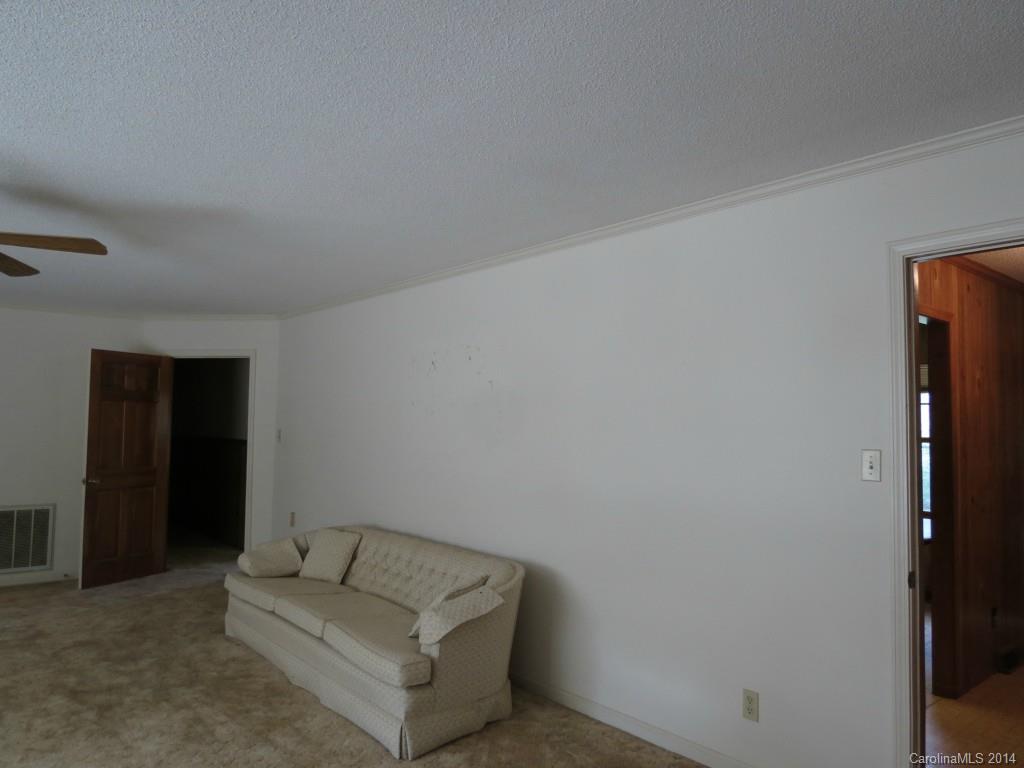 4655 Percival Road Rock Hill, SC 29730 - Photo 13 of 14 a living room with furniture and a window