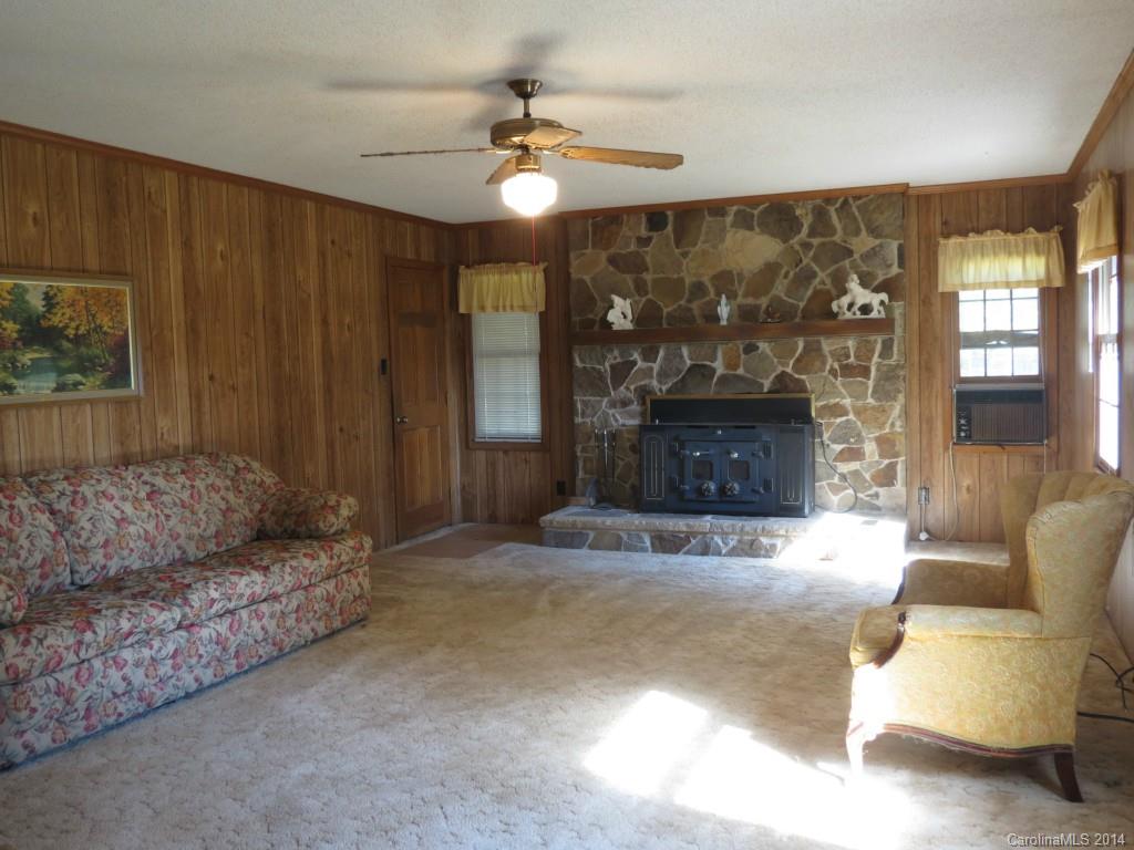 4655 Percival Road Rock Hill, SC 29730 - Photo 6 of 14 a living room with furniture and a fireplace