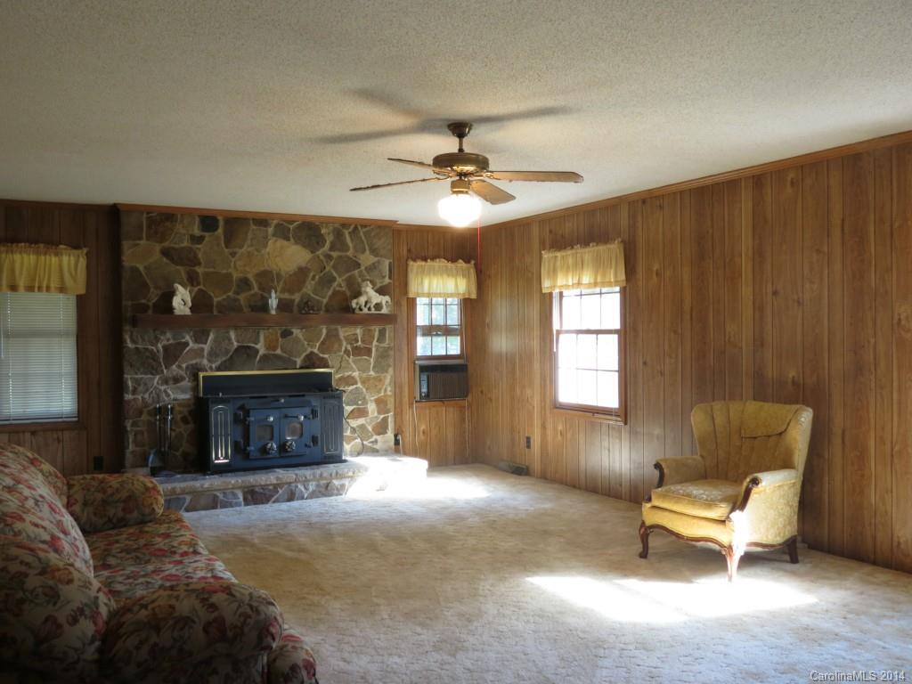 4655 Percival Road Rock Hill, SC 29730 - Photo 7 of 14 a living room with furniture and a fireplace