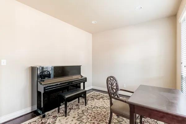 a view of a workspace with furniture