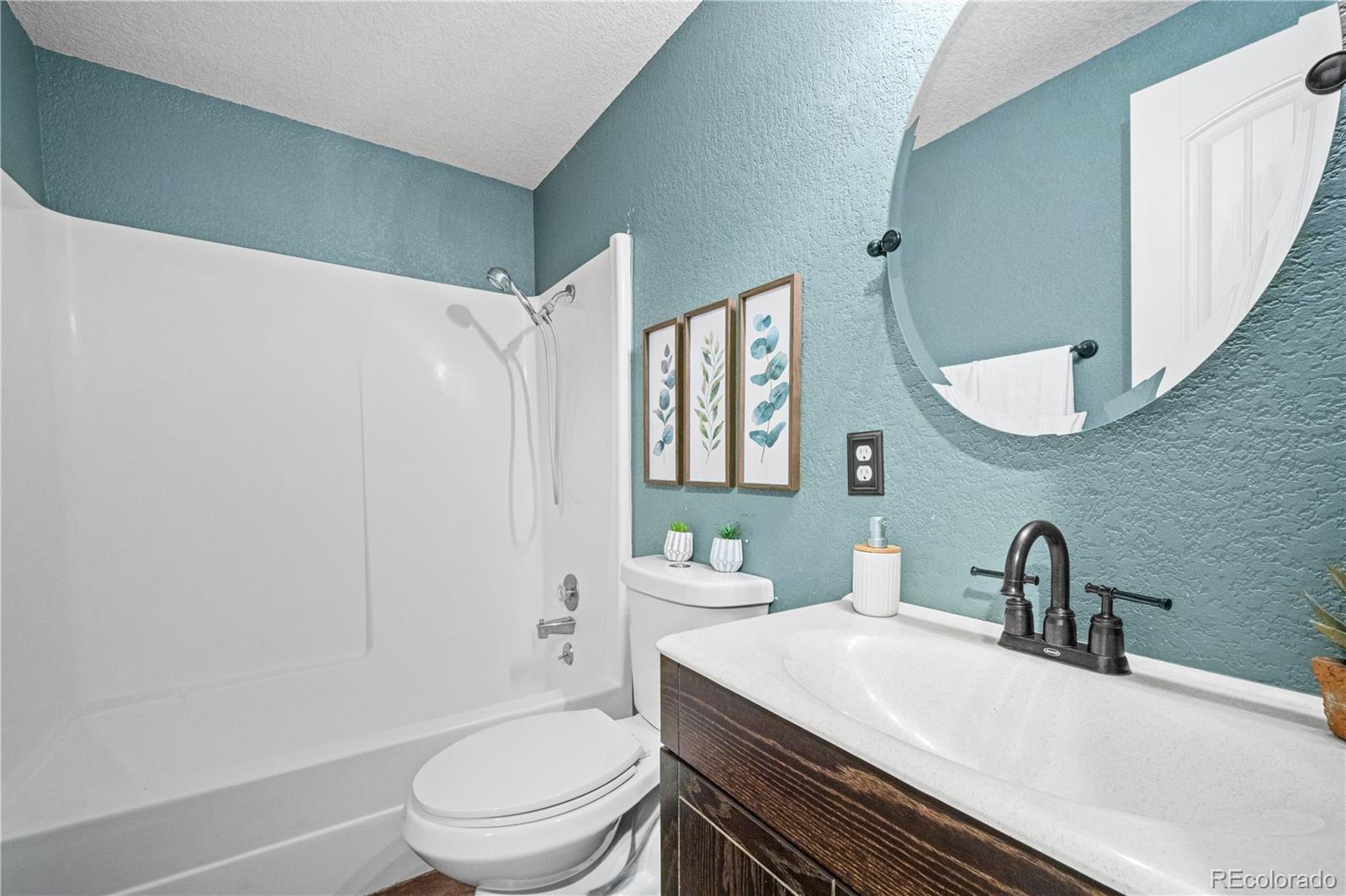 3126 County Rd CC254 Colorado City, CO 81019 - Photo 28 of 50 a bathroom with a sink toilet and shower