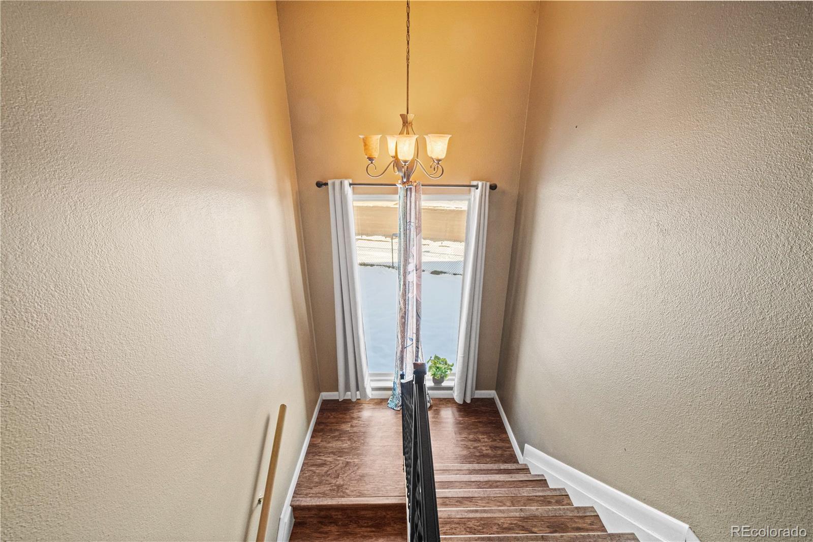 3126 County Rd CC254 Colorado City, CO 81019 - Photo 29 of 50 a view of a room with wooden floor and a window