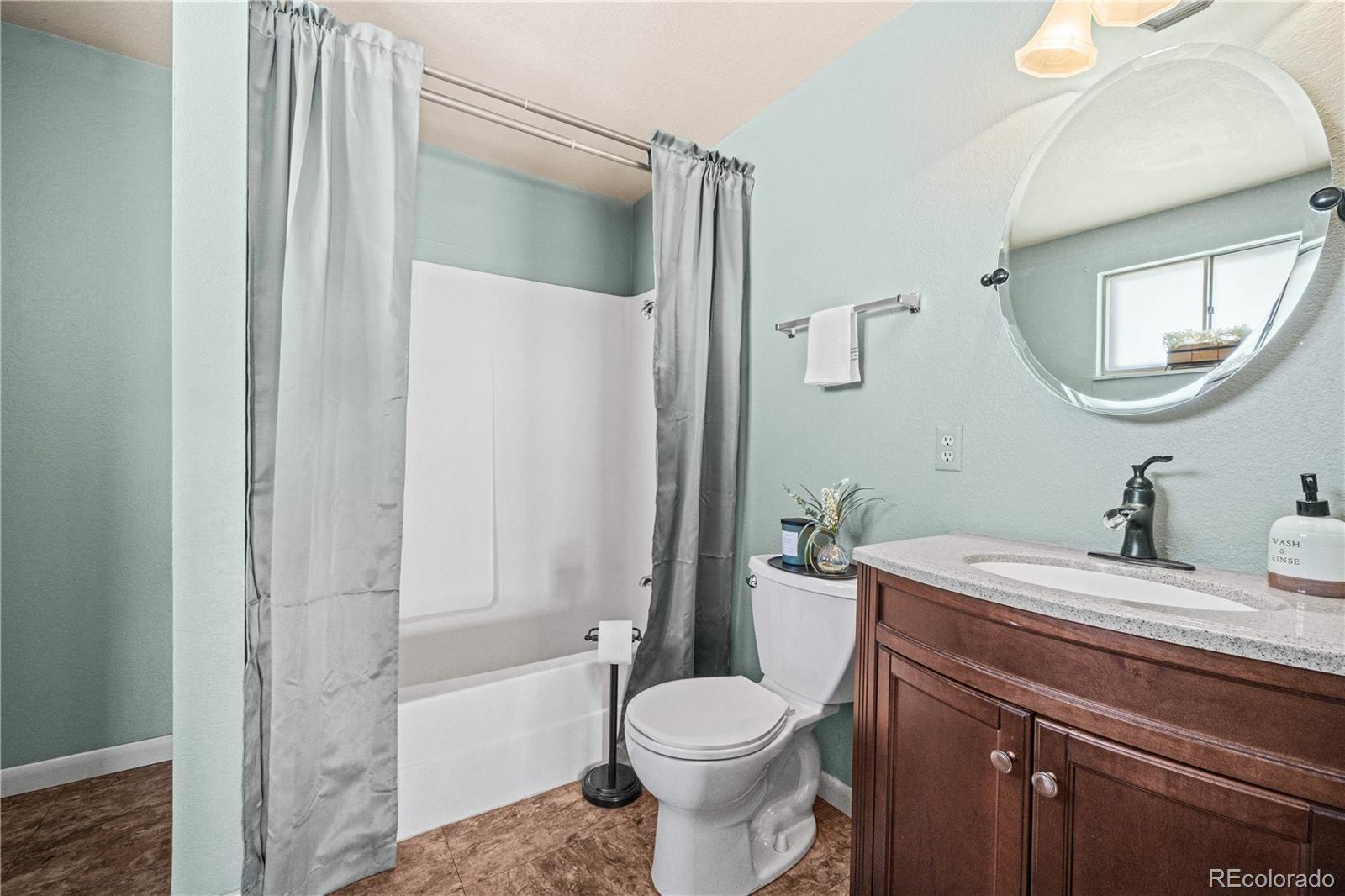3126 County Rd CC254 Colorado City, CO 81019 - Photo 30 of 50 a bathroom with a sink toilet and shower