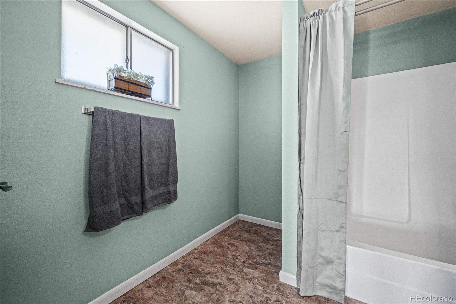 3126 County Rd CC254 Colorado City, CO 81019 - Photo 31 of 50 a room with a wooden floor and a window