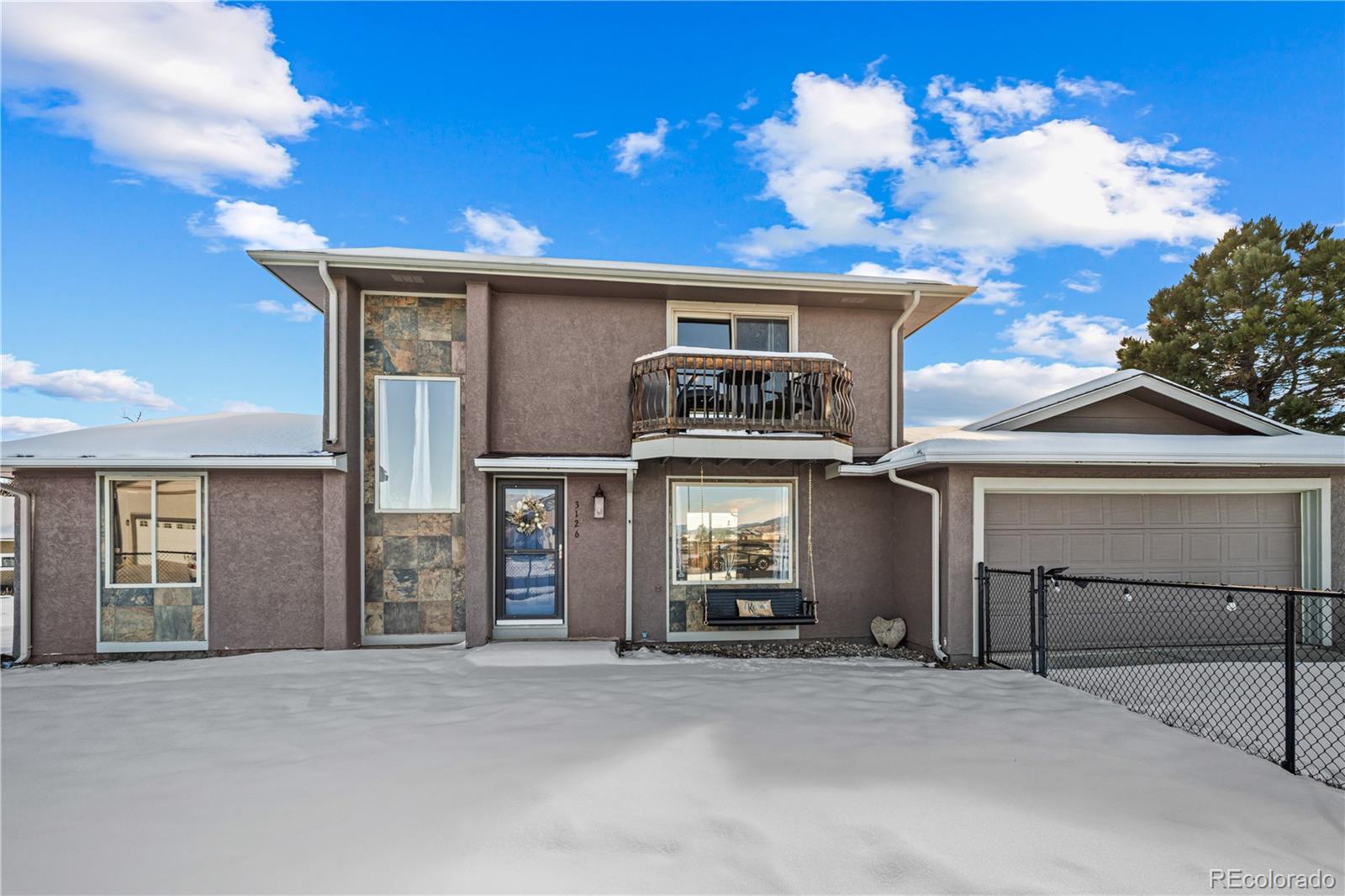 3126 County Rd CC254 Colorado City, CO 81019 - Photo 45 of 50 a front view of a house with a garage