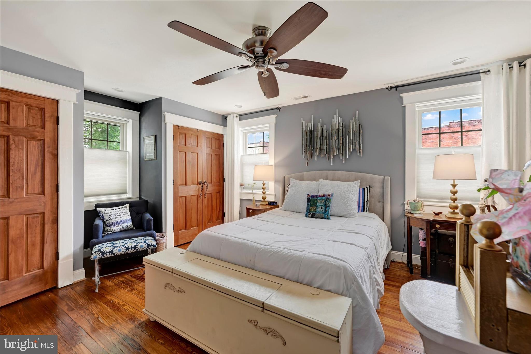 4224 Evans Chapel Road Baltimore, MD 21211 - Photo 13 of 24 a bedroom with a bed and a table