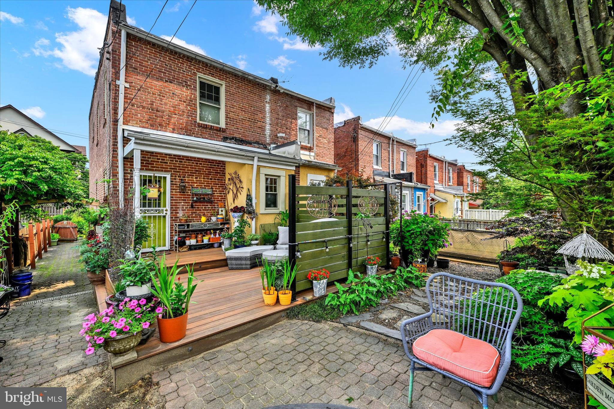 4224 Evans Chapel Road Baltimore, MD 21211 - Photo 24 of 24 a front view of a house with a yard