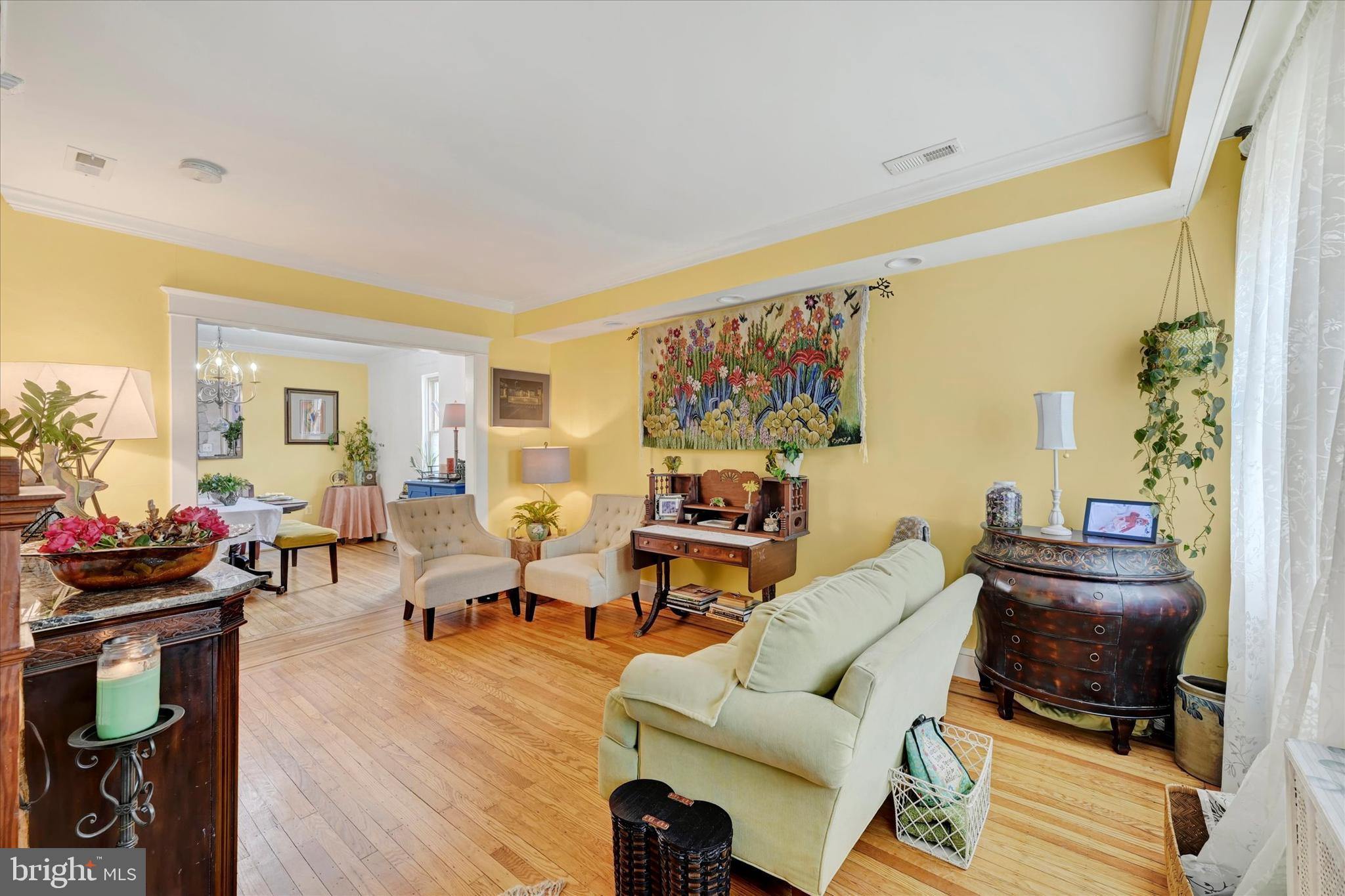 4224 Evans Chapel Road Baltimore, MD 21211 - Photo 4 of 24 a living room with furniture and wooden floor