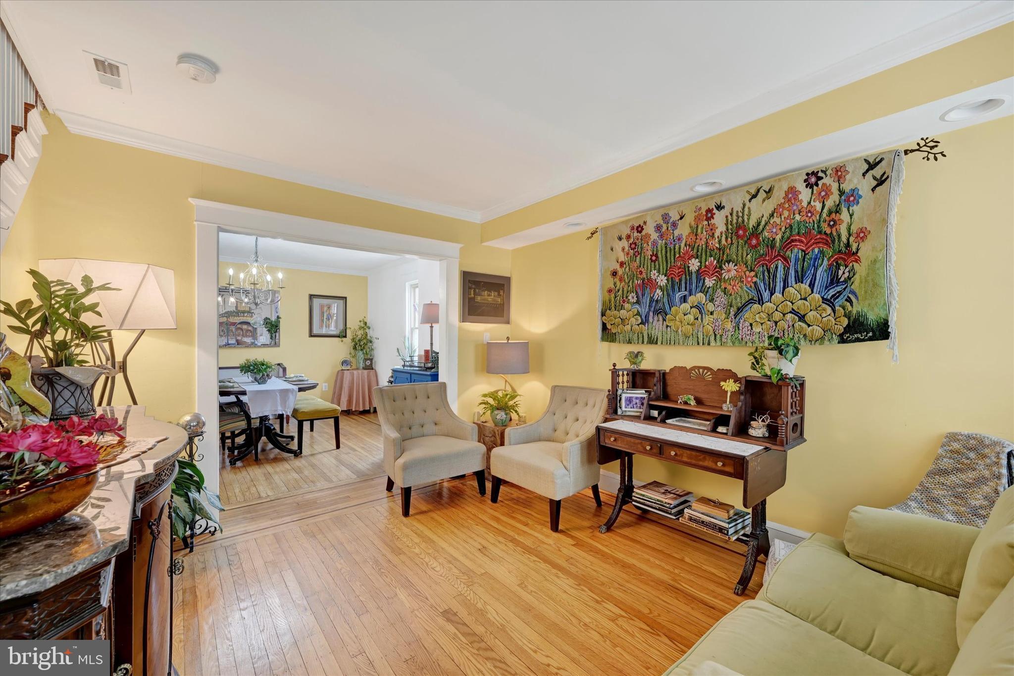 4224 Evans Chapel Road Baltimore, MD 21211 - Photo 5 of 24 a living room with furniture and wooden floor