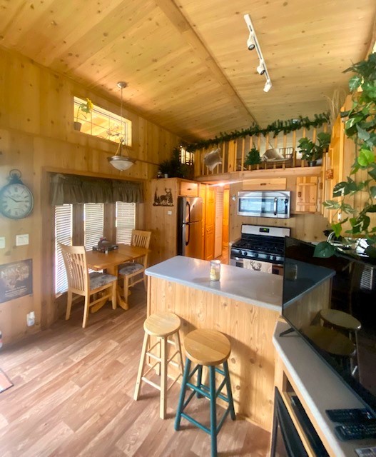 8-90 Woodhaven Sublette, IL 61367 - Photo 14 of 30 a dining room with furniture and a kitchen view