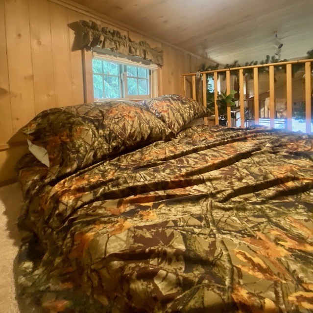 8-90 Woodhaven Sublette, IL 61367 - Photo 24 of 30 a bed sitting in a bedroom next to a window