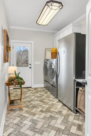 a bedroom with a bed and a mirror