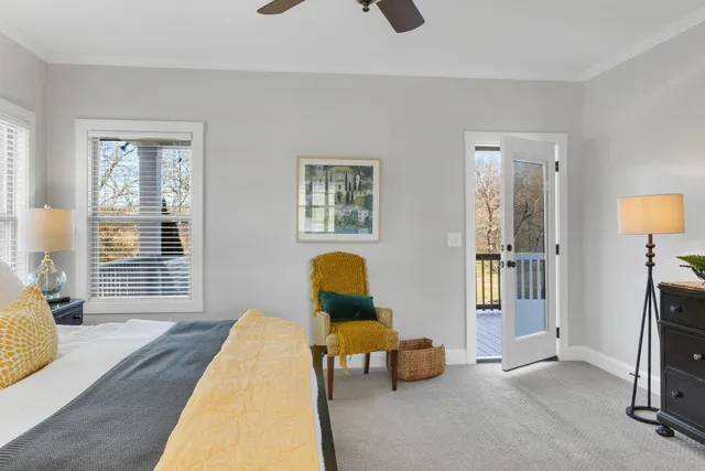 a bedroom with a bed and a cabinets