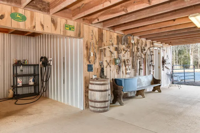 a view of a bathroom with shower and a curtain