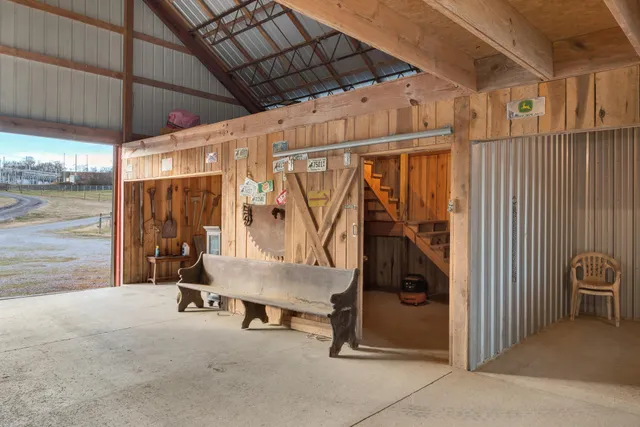 a view of an empty room with a iron stairs