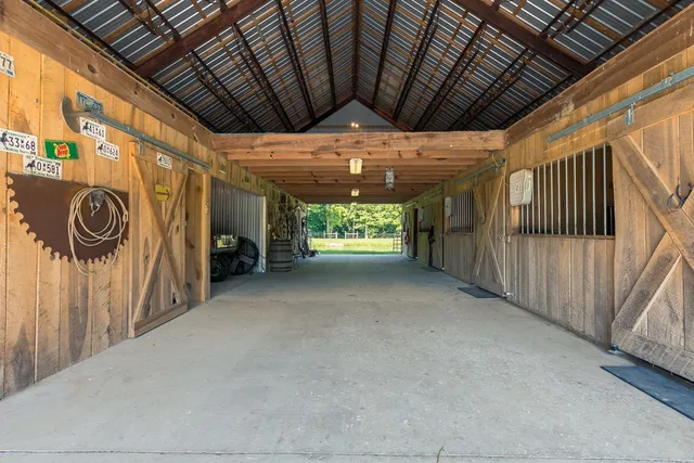 a view of a room with wooden walls