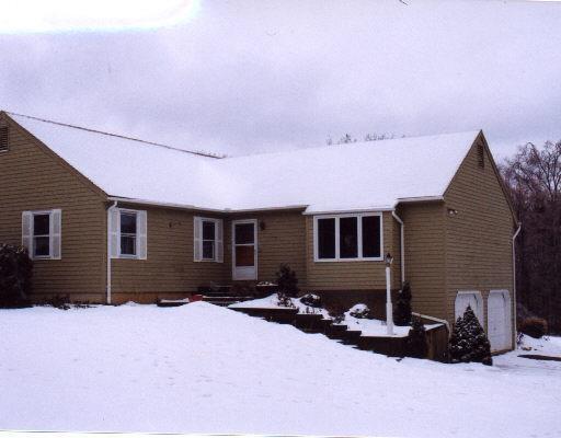 12 Mike Road Litchfield, CT 06759 - Photo 1 of 1 a front view of house with yard