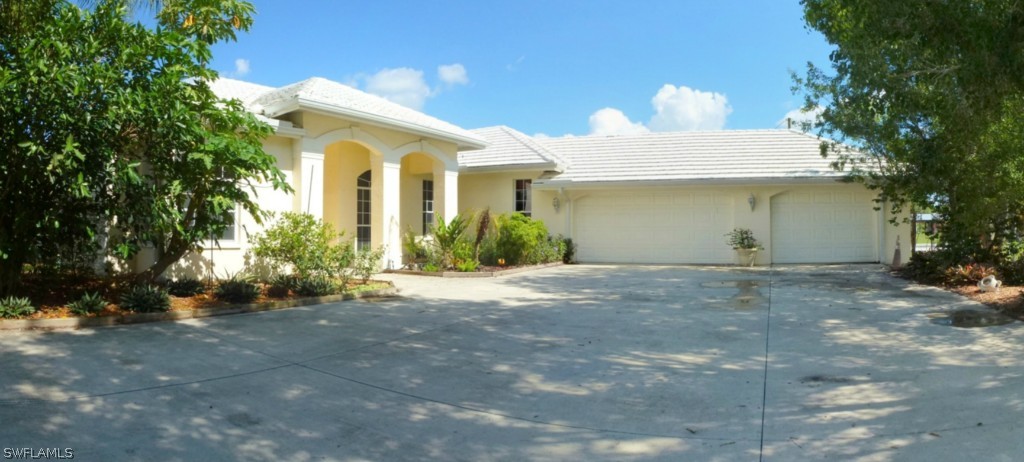 11920 Shawnee Road Fort Myers, FL 33913 - Photo 1 of 25 a view of a house with a outdoor space