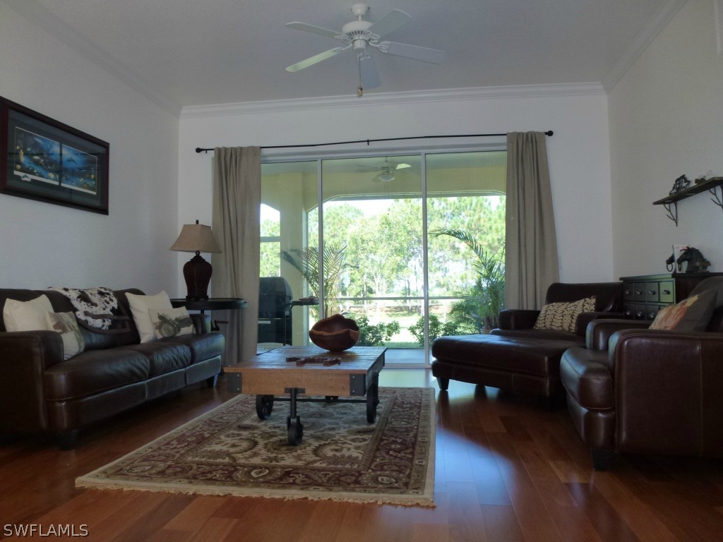 11920 Shawnee Road Fort Myers, FL 33913 - Photo 25 of 25 a living room with furniture and a large window