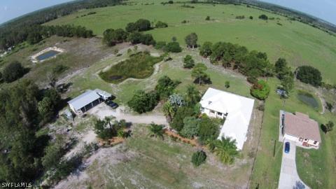 11920 Shawnee Road Fort Myers, FL 33913 - Photo 5 of 25 an aerial view of a house with a yard