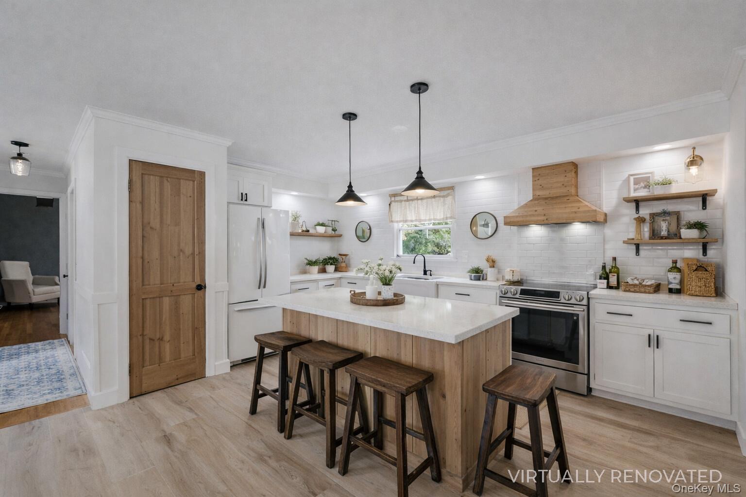 48 Nidzyn Avenue Remsenburg, NY 11960 - Photo 12 of 43 a kitchen with stainless steel appliances kitchen island a table and chairs in it